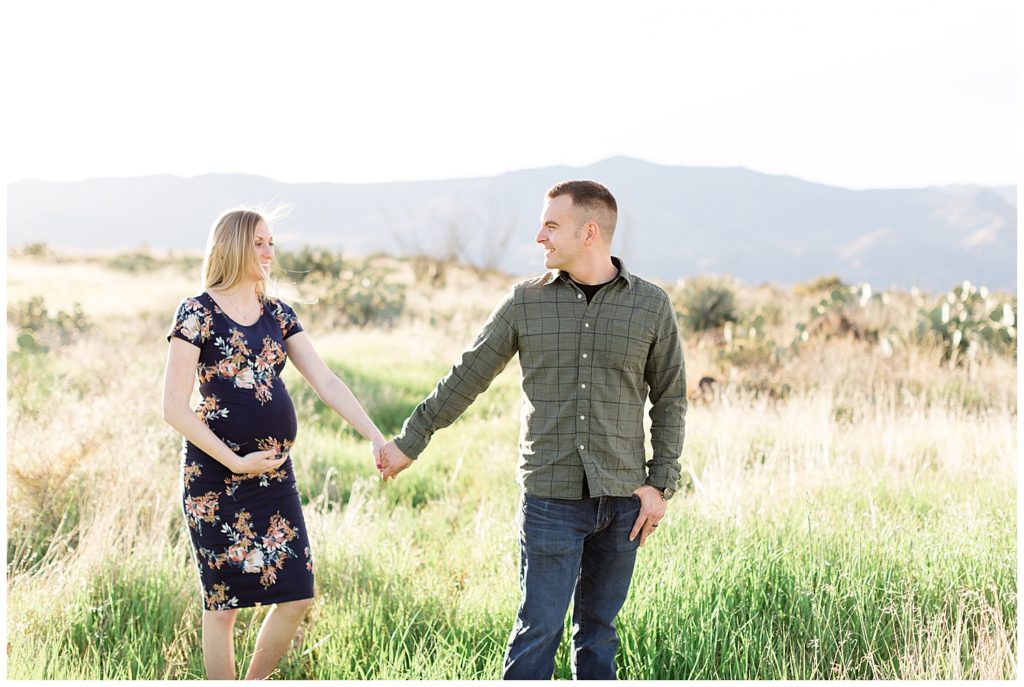 grassy maternity session in arizona on a mountain top