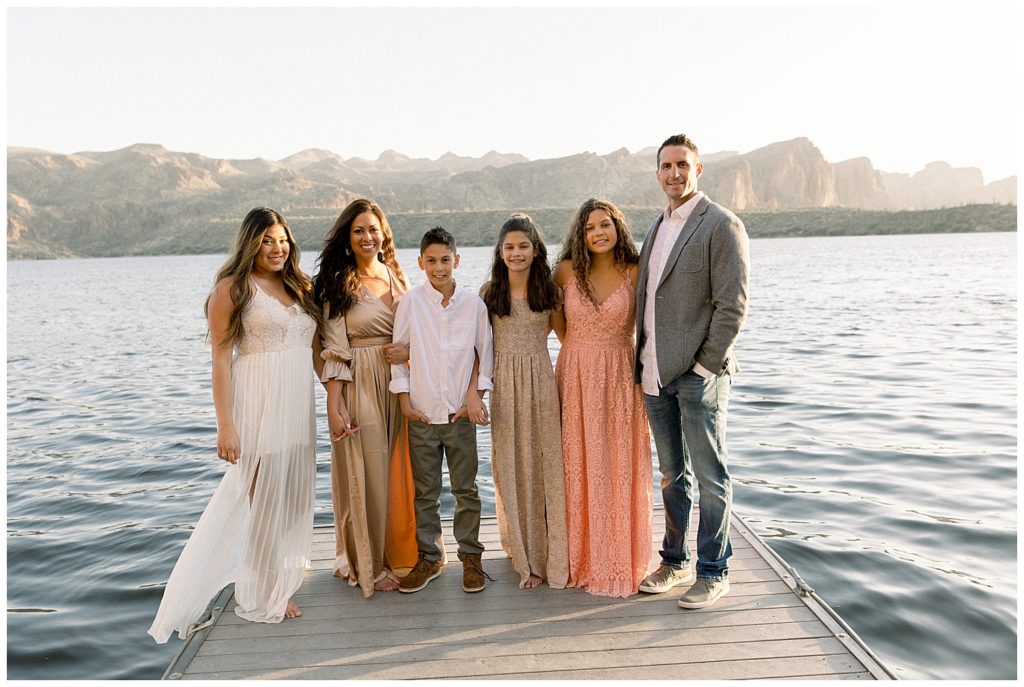 Big families, coordinating neutral color tones for lakeside family session in AZ