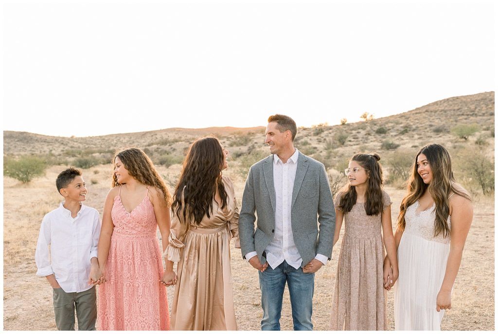 large family's coordinating neutral color palette for photos in the desert