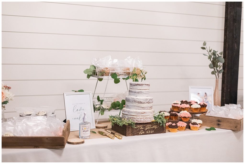 Cake table with crumbl cookies at firehouse event center