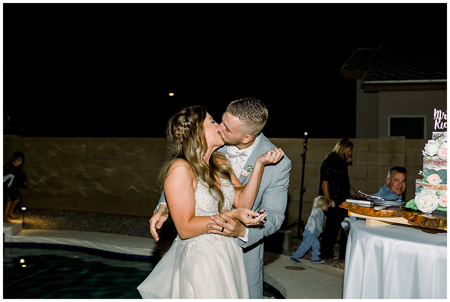 Cake Smash husband and wife kiss at Estate Wedding in Arizona