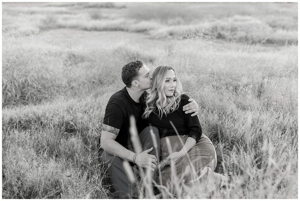 gold and black Fall Maternity session in the grasslands of Arizona